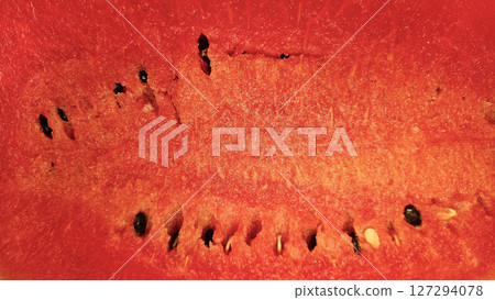 Close-up of ripe fresh sweet juicy watermelon, natural food background Close-up of ripe fresh sweet juicy watermelon, natural food background 127294078