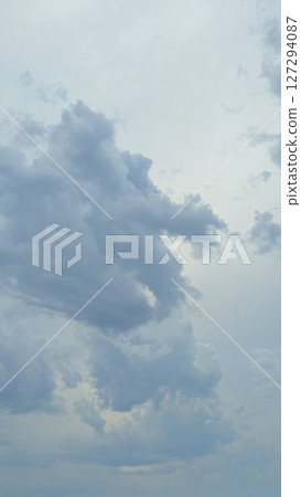 Blue rain clouds in the sky, natural background Blue rain clouds in the sky, natural background 127294087