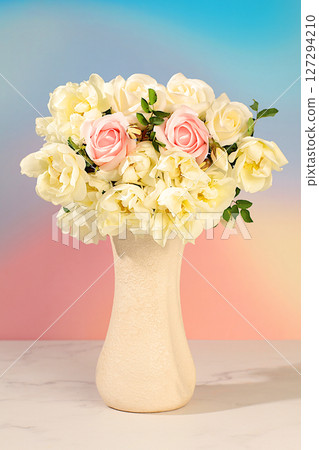 Still life with beautiful columbine flowers, cream rose and wild rose in vase on elegant modern table,Abstract flower arrangement. template for your design with place for text, minimalist beauty 127294210