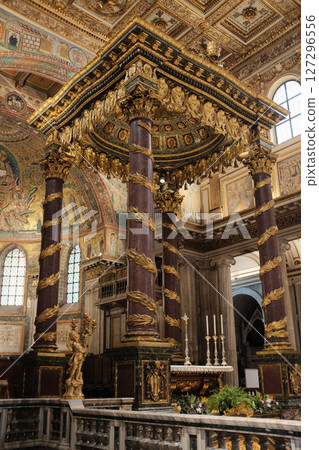 Upper chapel inside Basilica of Saint Mary Major Rome with baroque altar golden framing Christmas garlands and richly colored architectural details. High quality photo Upper chapel inside Basilica of Saint Mary Major Rome with baroque altar golden framing Christmas garlands and richly colored architectural details. High quality photo 127296556