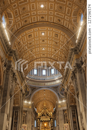 Central nave of Saint Peters Basilica decorated for Christmas with golden coffered ceiling marble floors and tourists walking toward the papal altar in Vatican City. High quality photo Central nave of Saint Peters Basilica decorated for Christmas with golden coffered ceiling marble floors and tourists walking toward the papal altar in Vatican City. High quality photo 127296574