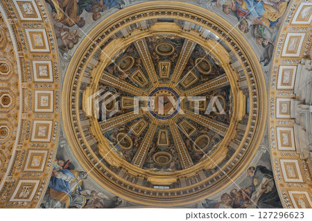 Ornate vaulted ceilings and central dome of Saint Peters Basilica in Vatican City richly decorated with golden details frescoes and religious architecture. High quality photo Ornate vaulted ceilings and central dome of Saint Peters Basilica in Vatican City richly decorated with golden details frescoes and religious architecture. High quality photo 127296623