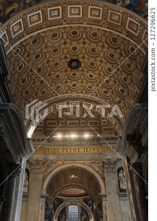 Ornate vaulted ceilings and central dome of Saint Peters Basilica in Vatican City richly decorated with golden details frescoes and religious architecture. High quality photo Ornate vaulted ceilings and central dome of Saint Peters Basilica in Vatican City richly decorated with golden details frescoes and religious architecture. High quality photo 127296625
