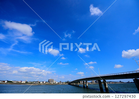 Bridge and the sea: Blue sky during the rainy season 127297430