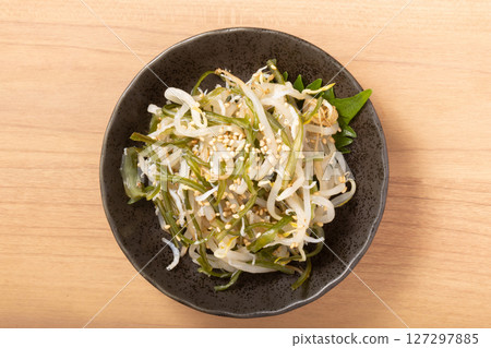 Wakame seaweed stems tossed with bean sprouts 127297885