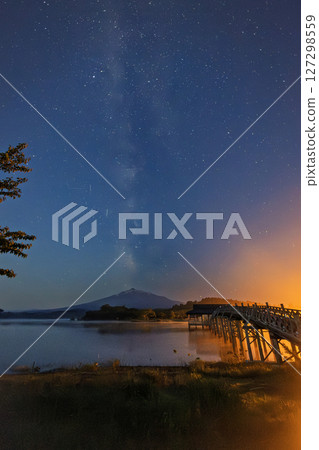 Aomori Prefecture Tsurunomai Bridge and the Milky Way over Mt. Iwaki04 127298559