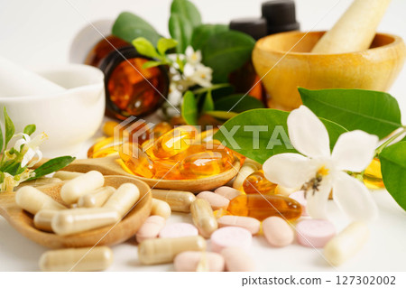 Alternative medicine herbal organic capsule with vitamin E omega 3 fish oil, mineral, drug with herbs leaf natural supplements for healthy good life. 127302002