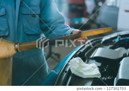 Long nozzle oil jug engine oil change auto mechanic Long nozzle oil jug engine oil change auto mechanic 127302703