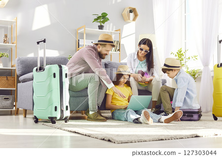 Family vacation happy choosing online together, planning, preparing for travel recreation 127303044