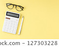 Glasses calculator and pen top view. 127303228