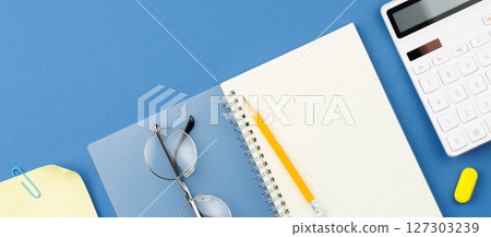 Notepad, pencil, calculator, note sheet, glasses. 127303239