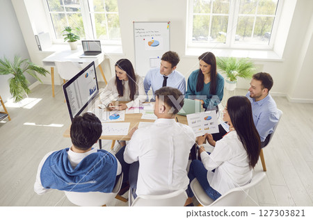 Team Of Colleagues Working On Business Accounting With Computer 127303821
