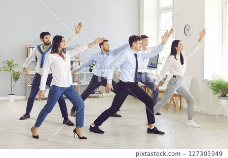 Business people office group yoga, healthy lifestyle break during work, young office workers Business people office group yoga, healthy lifestyle break during work, young office workers 127303949