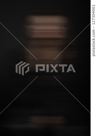 Abstract woman silhouette in motion blur effect 127304001