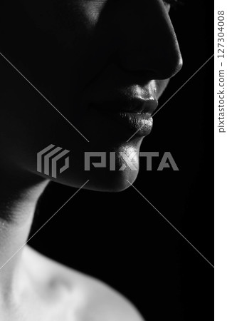 Part beautiful woman face silhouette covered in shadow Part beautiful woman face silhouette covered in shadow 127304008