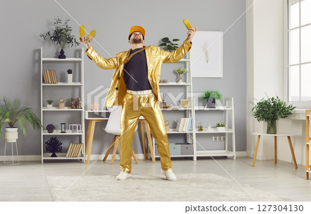 Rich Man In Golden Business Suit Celebrating Financial Success At Home 127304130