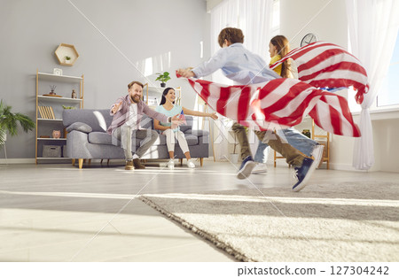 Happy American Family Celebrating Independence Day At Home Happy American Family Celebrating Independence Day At Home 127304242