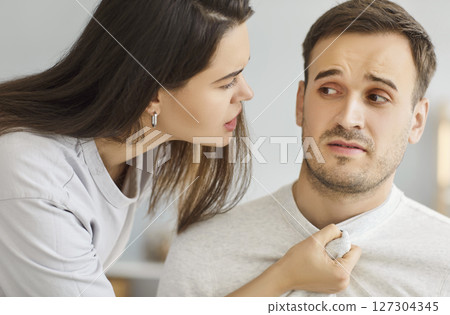 Wife Threatening Husband During Family Conflict At Home 127304345