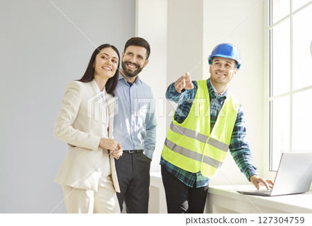 Married Couple And Architect Planning Home Renovation Together 127304759