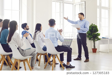 Boss Conducting Work Group Meeting For Office Team 127305183