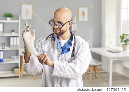 Happy Medical Professional Doctor In Funny Glasses In Hospital Or Clinic Happy Medical Professional Doctor In Funny Glasses In Hospital Or Clinic 127305425