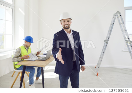 Happy Businessman, Architect, Or Constructor Offering Handshake 127305661