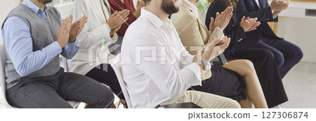 Office crowd excitement, employees applauding congratulating team with business achievement Office crowd excitement, employees applauding congratulating team with business achievement 127306874