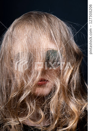 Abstract woman portrait with hairs on her face Abstract woman portrait with hairs on her face 127308206
