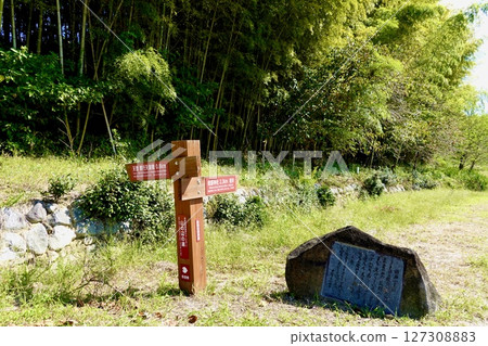 Yamanobe no Michi: A view of the tomb of Emperor Keikō and the signpost to Hibara Shrine, as well as the monument to Nukata no Okimi inscribed with a Man'yoshu poem. Sakurai City, Nara Prefecture. Yamanobe no Michi: A view of the tomb of Emperor Keikō and the signpost to Hibara Shrine, as well as the monument to Nukata no Okimi inscribed with a Man'yoshu poem. Sakurai City, Nara Prefecture. 127308883