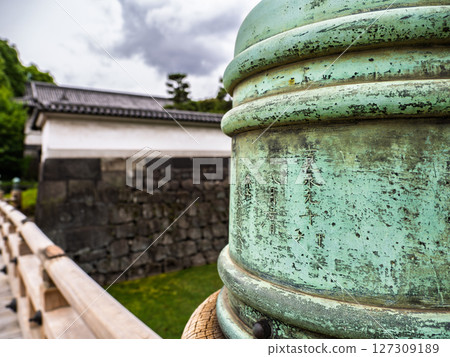 Edo period balustrade and engraved characters on the railing of Hirakawa Bridge at the site of Edo Castle Edo period balustrade and engraved characters on the railing of Hirakawa Bridge at the site of Edo Castle 127309189