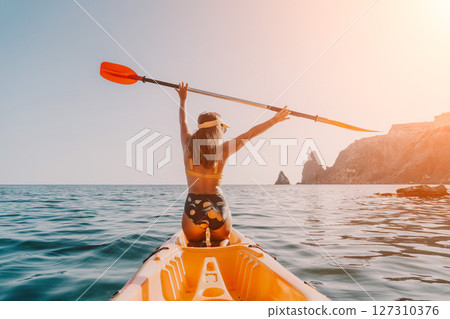 Kayaking Woman Ocean - Happy Woman Kayak Paddling Sea 127310376