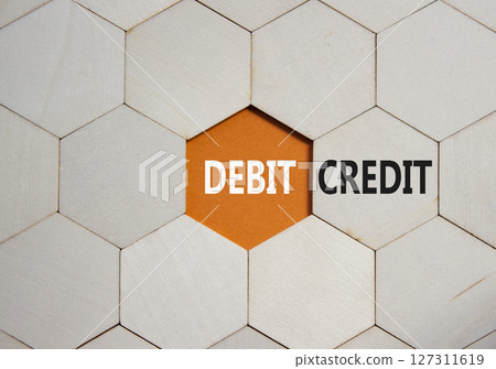 Lend or Borrow symbol. Concept word Lend or Borrow on wooden comb puzzle. Beautiful orange background. Business and Lend or Borrow concept. Copy space Lend or Borrow symbol. Concept word Lend or Borrow on wooden comb puzzle. Beautiful orange background. Business and Lend or Borrow concept. Copy space 127311619