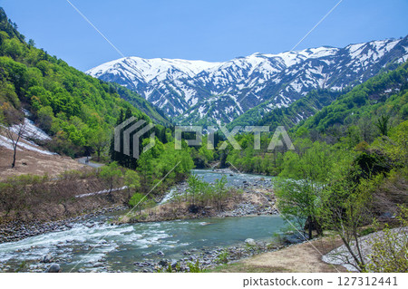 Tamagawa River and snow-covered mountains Tamagawa River and snow-covered mountains 127312441