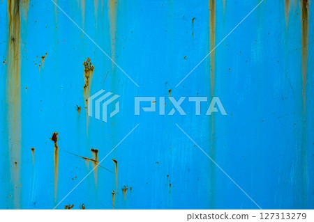 Rusty metal surface in weathered industrial outdoor setting 127313279