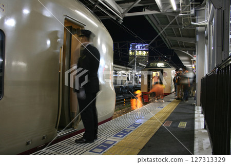Sunrise Seto and Izumo sleeper express trains being coupled at Okayama Station 127313329