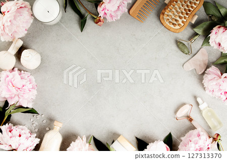 Spa Flat Lay with Facial Rollers, Peonies and Skincare Tools Spa Flat Lay with Facial Rollers, Peonies and Skincare Tools 127313370
