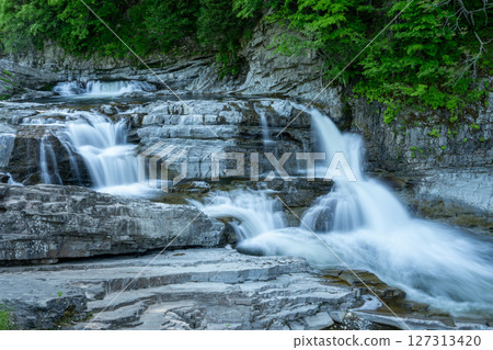 Sandan Falls, a waterfall surrounded by fresh greenery, Ashibetsu City, Hokkaido 127313420