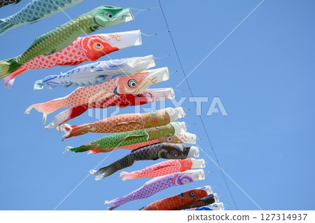 Carp streamer swimming in the blue sky Carp streamer swimming in the blue sky 127314937