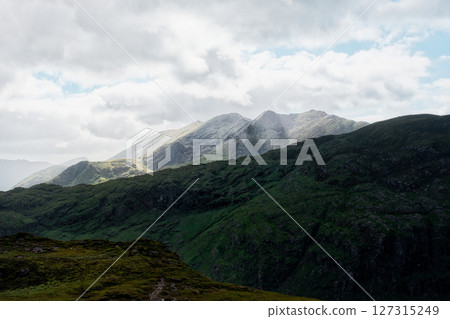 Overcast day reveals the rugged landscape of Head of Gap of Dunloe in County Kerry, Ireland. 127315249