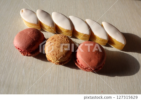 An Exciting and Delicious Assortment of Colorful Macarons and Other Sweet Treats to Enjoy 127315629