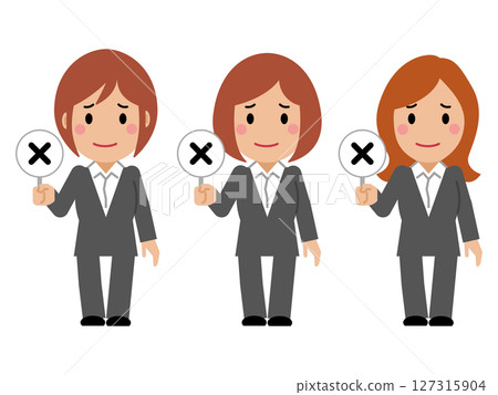 A young woman in a gray suit holding up a wrong answer card A young woman in a gray suit holding up a wrong answer card 127315904
