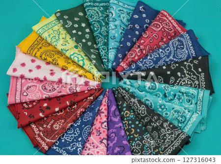 Vibrant Multicolor Paisley Bandana Collection Arranged in Fan Shape on Turquoise Background, Classic Cotton Kerchiefs in Assorted Colors for Fashion, Crafts, and Western Decor 127316043
