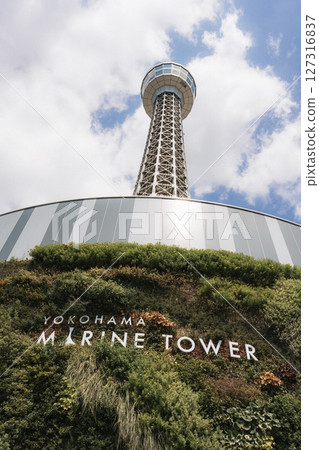 Yokohama, Japan - 05 June 2025 : Yokohama Marine Tower near Tokyo, Japan, which was filmed on a clear afternoon in early summer Yokohama, Japan - 05 June 2025 : Yokohama Marine Tower near Tokyo, Japan, which was filmed on a clear afternoon in early summer 127316837