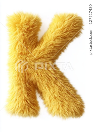 A vibrant fluffy yellow letter K sits prominently against a bright white background, exuding a fun and playful vibe suited for decorative purposes 127317420