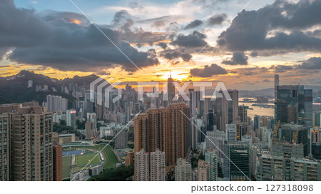 June 10 2025 View of a Modern Skyline at Dusk with Mountain Background 127318098
