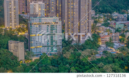June 10 2025 View of Modern Buildings Surrounded by Lush Green Urban Landscape June 10 2025 View of Modern Buildings Surrounded by Lush Green Urban Landscape 127318136