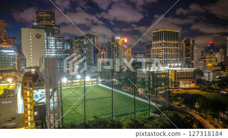 June 10 2025 Illuminated Urban Soccer Field Surrounded by Tall Buildings at Night June 10 2025 Illuminated Urban Soccer Field Surrounded by Tall Buildings at Night 127318184