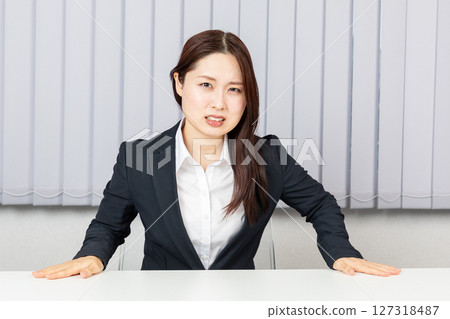 Asian woman suing 01 Asian woman suing 01 127318487