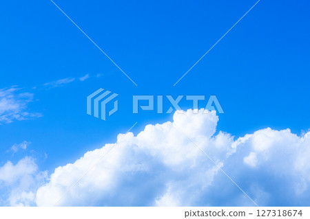 Image of a summery blue sky and white clouds 127318674