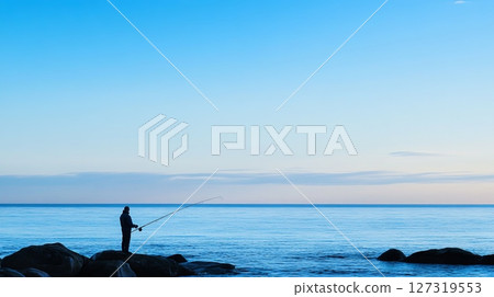 Tranquil Sunset Fishing Scene in Skane, Sweden 127319553